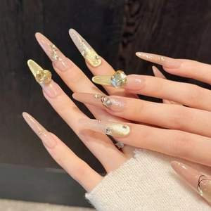 Nude coffee gradient cat eye press-on nails with champagne diamonds and gold glitter