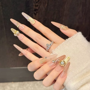 Luxury champagne gradient cat-eye press-on nails with 3D crystals and gold glitter