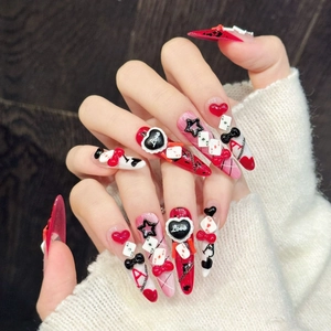 3D poker press-on nails with red heart ace design and metal chain decorative elements