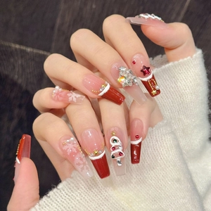 Christmas press-on nails with red velvet, embossed snowflakes and rhinestone accents