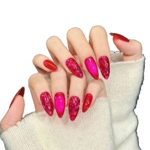 Handmade dragon fruit magenta cat-eye press-on nails in long almond stiletto shape