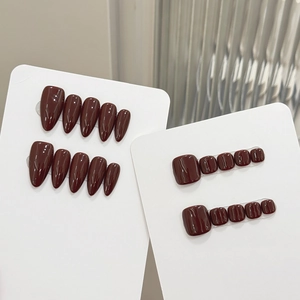 Glossy cherry red almond press-on nails set for fingers and toes on white display card