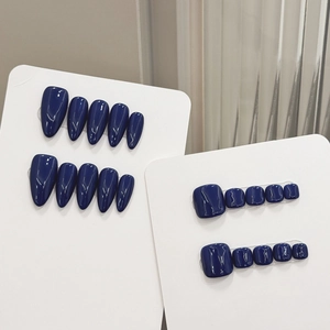 Glossy deep blue press-on nail set for hands and feet with minimalist almond shape