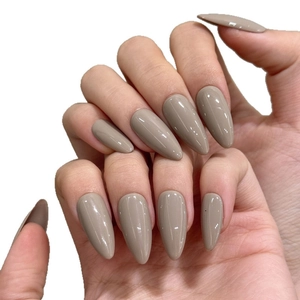 Glossy almond-shaped press-on nails in elegant minimalist greyish-brown finish