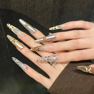 Y2K French leopard print press-on nails with silver stars and metallic finish long tips