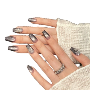 Handmade grey-purple cat eye press-on nails with glitter sequins and trapezoid shape