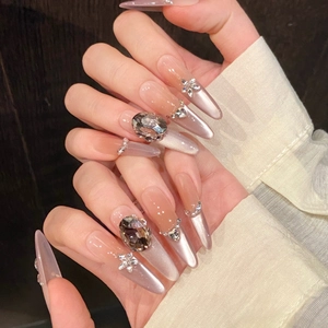 Purple gradient cat-eye press-on nails with 3D crystals and almond shape style