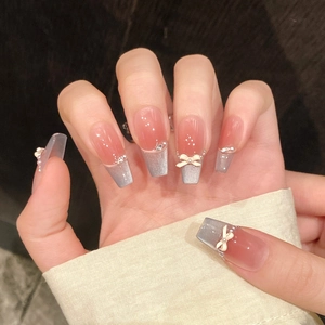 French cat eye press-on nails with 3D bows and pearls on long ballerina shape