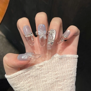 Blue gradient press-on nails with 3D crystal butterfly and sparkling diamond accents