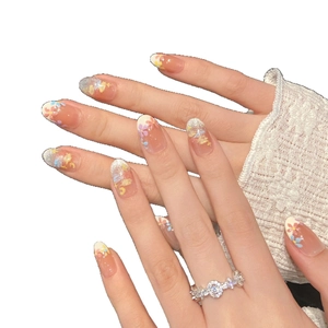 Unghie finte fatte a mano con motivi floreali, effetto occhi di gatto e glitter argento