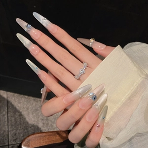 Extra long almond cat eye press-on nails with colorful rhinestones and pearls