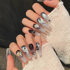 Long trapezoid gothic press-on nails with black gradient, rhinestones and metal accents
