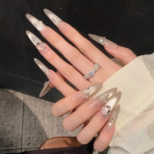 Elegant long stiletto cat-eye press-on nails with 3D heart crystals and pearls