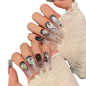 Gothic punk press-on nails featuring black gradient, silver smoke art, and cross charms