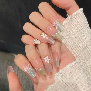 Long ballet press-on nails with 3D white flowers, butterfly charms and pearl details
