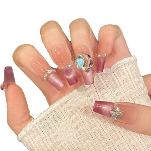 Pink and purple cat-eye gradient press-on nails with luxury rhinestones in ballet shape