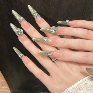 Sparkling mint green cat eye press-on nails with luxury rhinestones and pearls