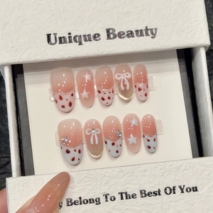 Faux Ongles à Presser Rose Blush Faits à La Main Avec Nœuds Blancs Et Étoiles Style Œil De Chat Amande Longue Pour Femme