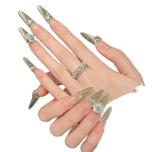 Sparkling mint green cat eye long stiletto press-on nails with luxury crystals