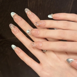 Blue cat eye French press-on nails with 3D bows and rhinestone glitter accents