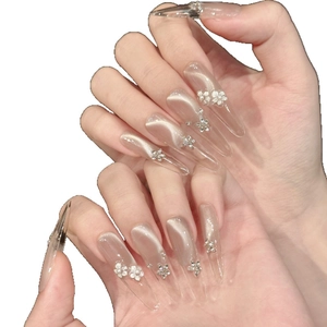 Handmade cat-eye press-on nails with champagne ice flower and 3D floral accents