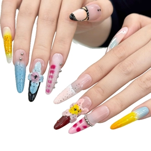 Handcrafted 3D floral press-on nails with macaron gradients and luxury sculptural art