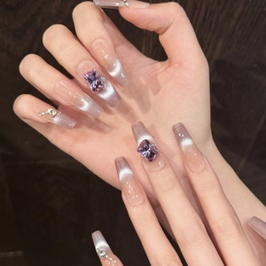 Elegant long trapezoid gradient cat eye press-on nails with large purple gemstone