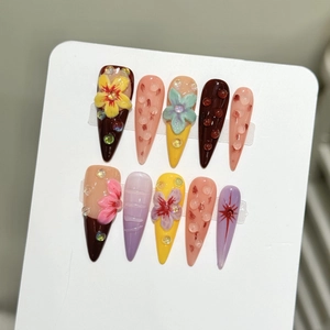 Handmade 3D floral press-on nails in colorful long stiletto style with water drop effects