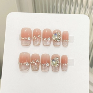 Handgefertigte Cat-Eye Kunstnägel mit rosa Farbverlauf, 3D-Blumen und Luxus-Strasssteinen