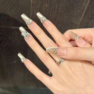 Champagne cat-eye press-on nails with luxury K9 crystals and long square oval shape