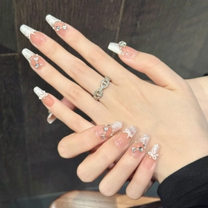 French tip handmade press-on nails with 3D white bow, pearls and glittering rhinestones