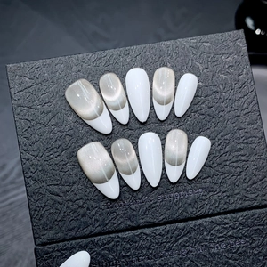 Minimalist white French press-on nails with champagne silver cat-eye magnetic glitter