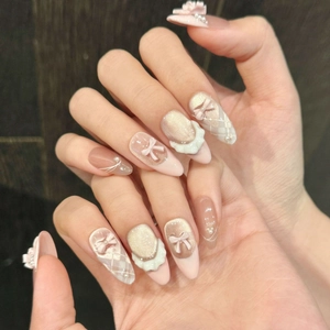 French ballet style cat eye pink press-on nails with 3D bows and pearl details