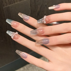 Handmade long trapezoid press-on nails with purple gradient and 3D bow design