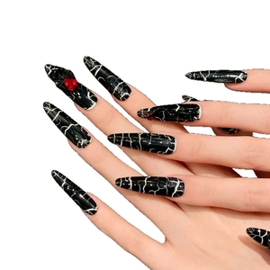 Gothic long stiletto press-on nails with black-white marble and 3D snake design