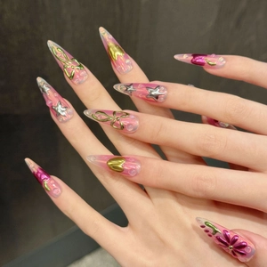 Y2K style stiletto press-on nails with 3D metallic bows and hearts in purple