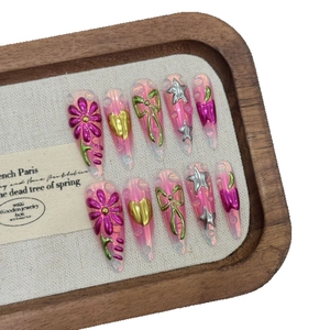 Tropical almond press-on nails with 3D metallic flowers and chrome pearl finish