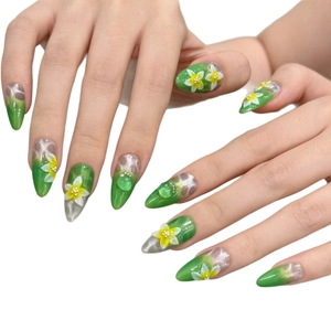 Handmade long almond press-on nails with green cat-eye gradient and 3D floral accents