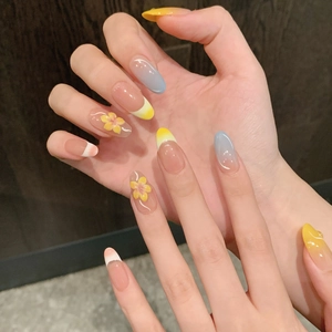 Pastel macaron press-on nails with 3D flower art and blue gradient in oval shape
