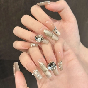 Champagne cat eye press-on nails with luxury crystals in long coffin shape