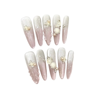 Pink gradient handmade press-on nails with 3D starfish shell and pearl ocean decorations