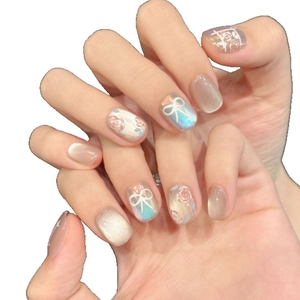 Handmade cat-eye press-on nails with 3D bows and hand-painted rose designs