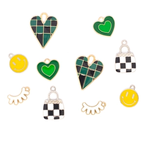 Macro shot of assorted colorful checkerboard heart and smiley oil-drop alloy charms