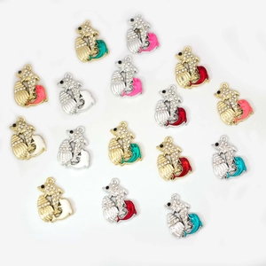 Sparkling dolphin shell charms in colorful enamel and rhinestones for DIY jewelry