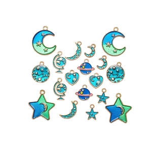 Set of 10 celestial blue enamel pendants featuring moon, stars and planets in gold alloy
