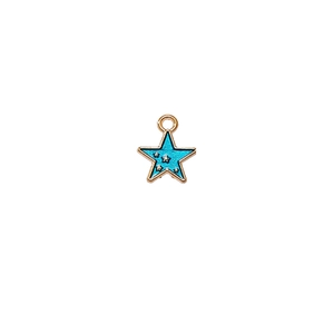 Detail of blue star charm with gold border for DIY jewelry and necklace making