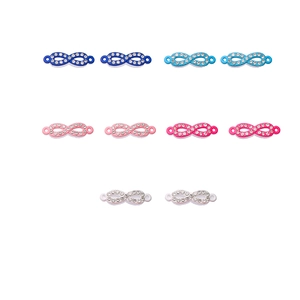 Detail of infinity charms with rhinestones in five colors for DIY jewelry making