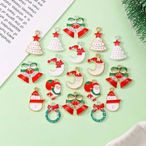 Macro shot of colorful enamel Christmas charms including trees and snowmen for DIY jewelry