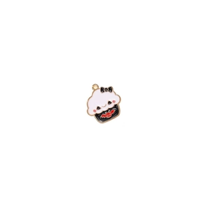 Macro detail of Halloween cupcake alloy pendant with bat motif for DIY jewelry making