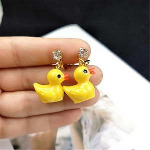 Classic yellow resin duck earrings with rhinestone details and gold-tone clip-on design